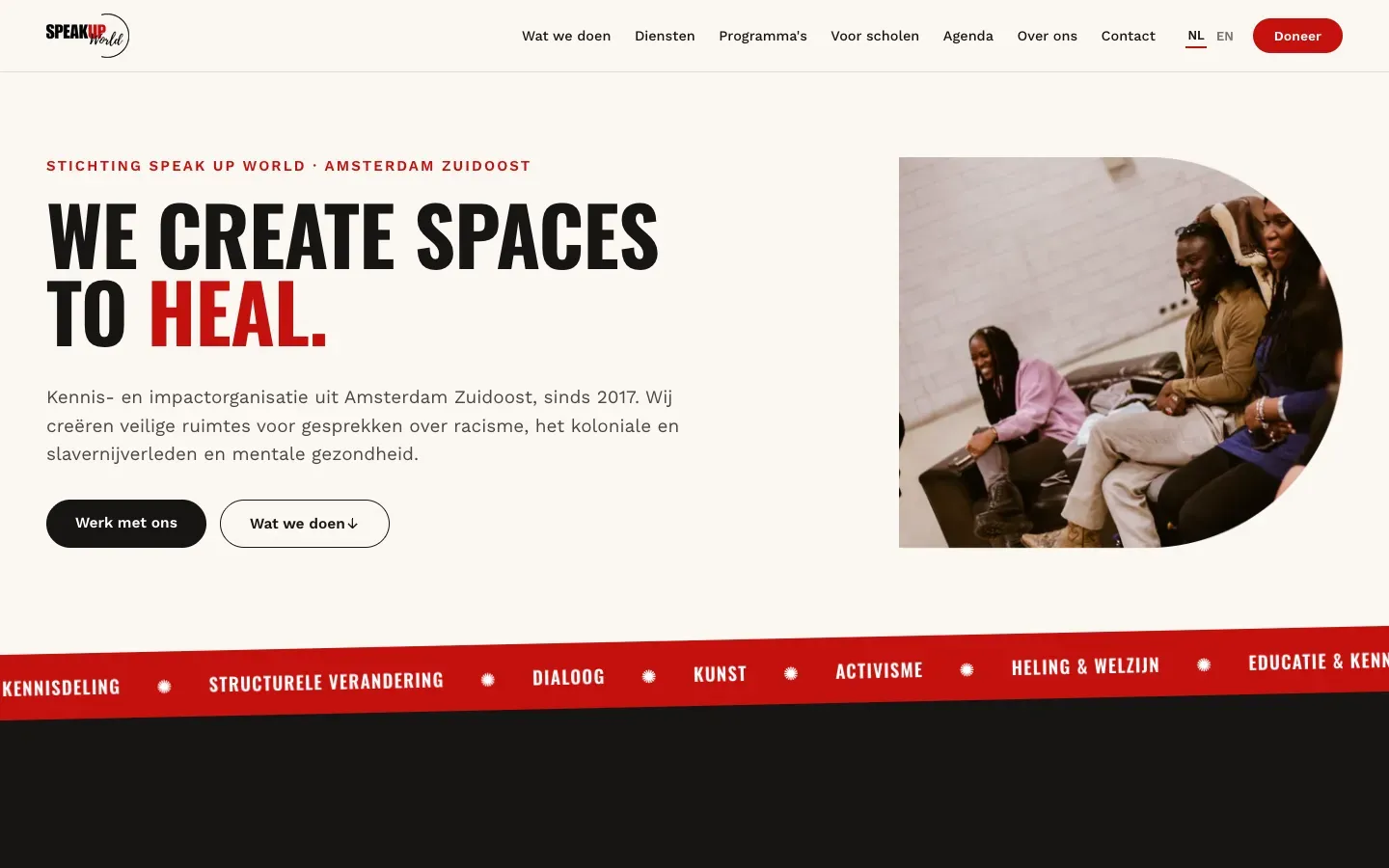 Speak Up World website design on a wide screen